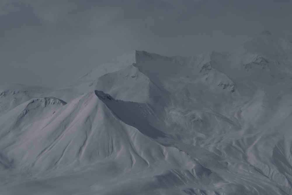 flying upward over the mountain